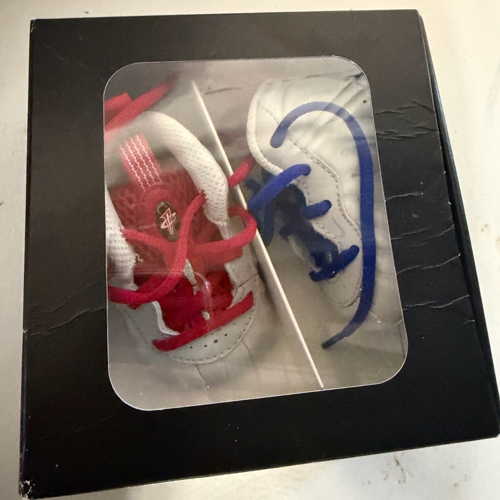 Nike Kids Sneakers in Red, Blue, and White